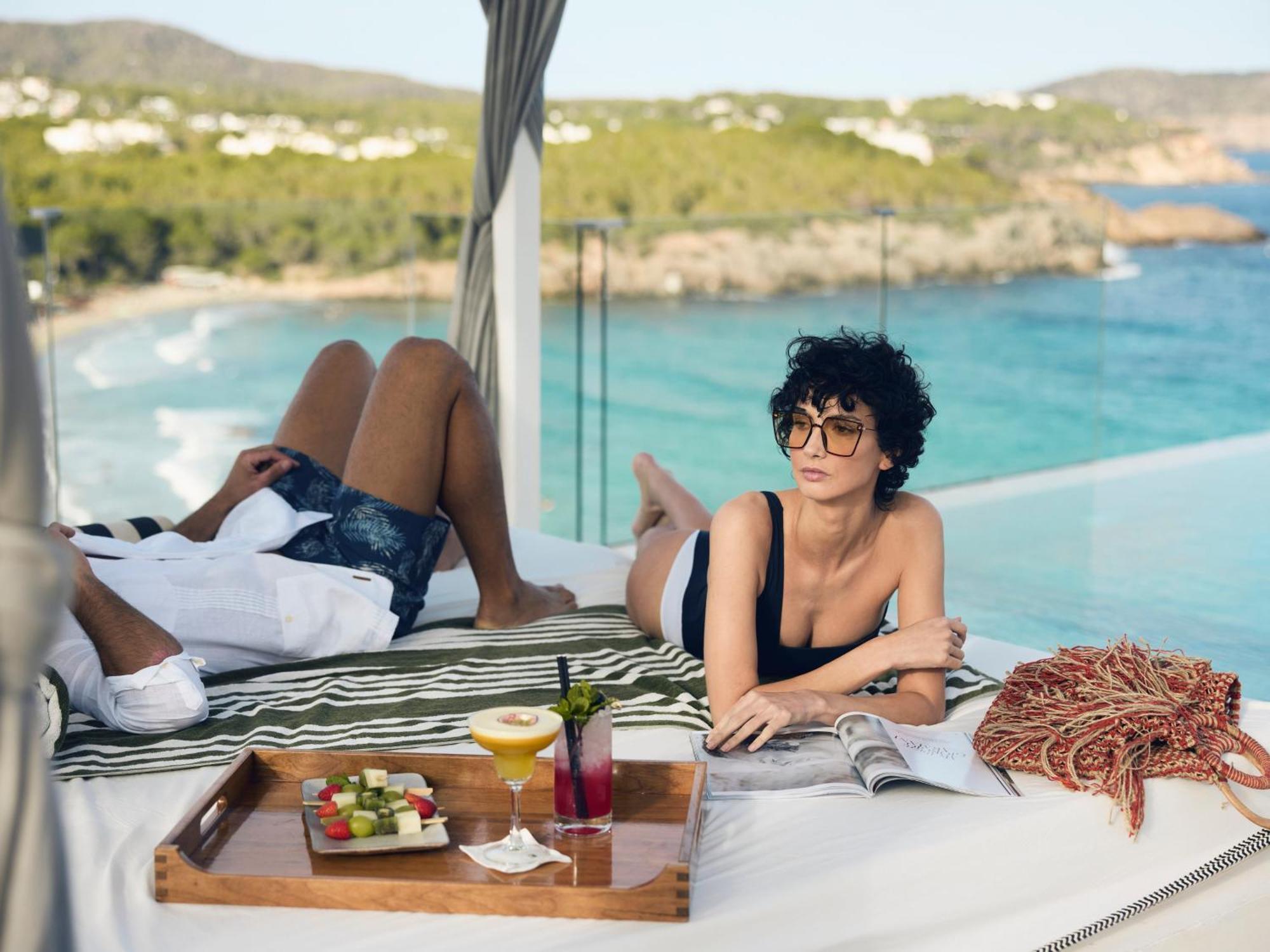 Bless Hotel Ibiza - The Leading Hotels Of The World Es Canar  Exterior photo A woman sunbathing