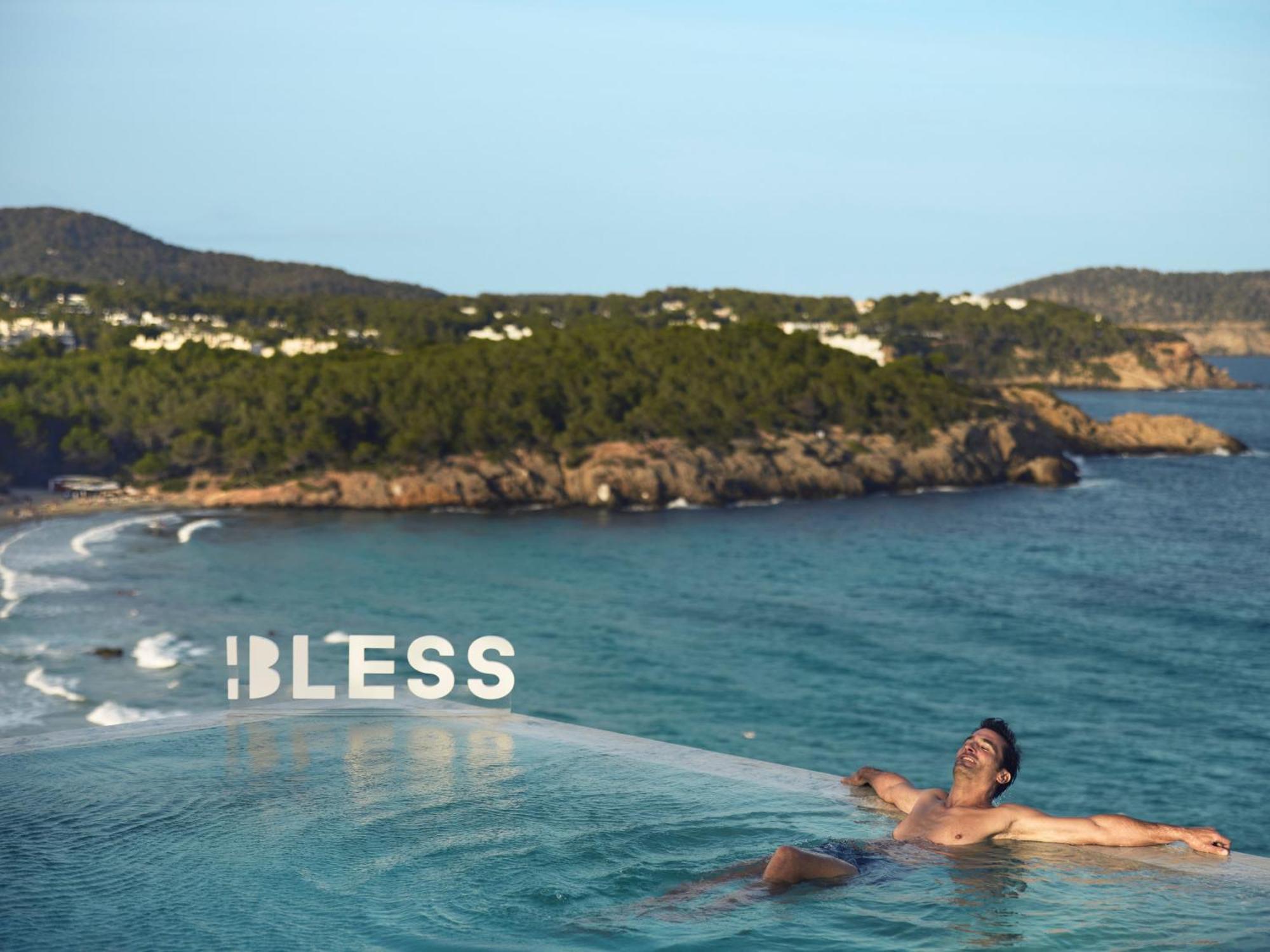 Bless Hotel Ibiza - The Leading Hotels Of The World Es Canar  Exterior photo A man relaxing at a pool